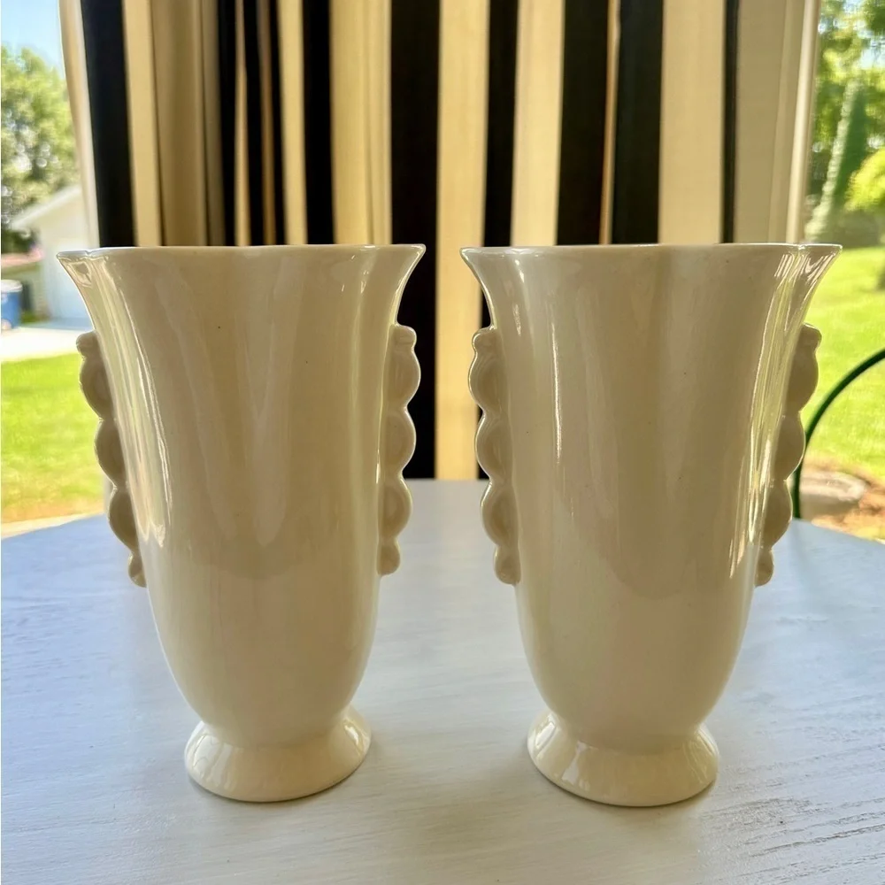 1950’S SET/2 , FLORAL VASES. SOFT CREAM COLOR WITH ONE SIDED FLORAL DESIGN.